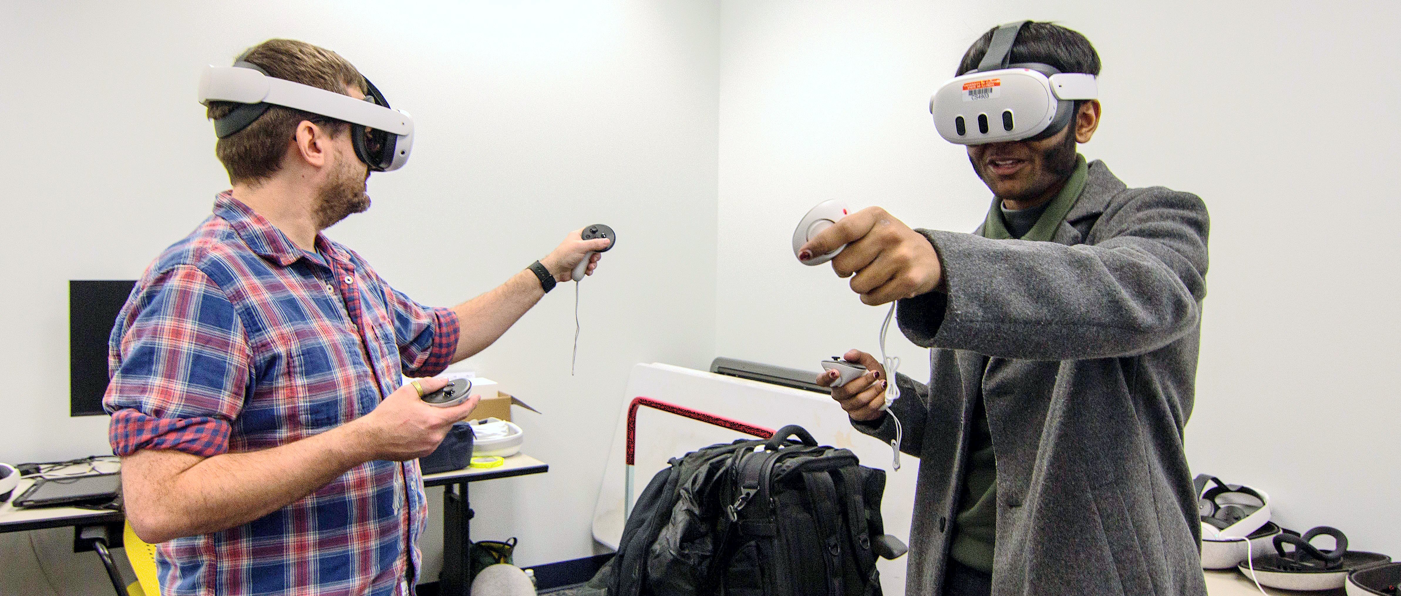James Planey (left), Assistant Director for Research at IMMERSE, demonstrating&amp;amp;amp;nbsp;ImmersityXR,&amp;amp;amp;nbsp;a multi-user&amp;amp;amp;nbsp;collaborative WebXR drawing app supported by Illinois Computes.&amp;amp;amp;nbsp;
